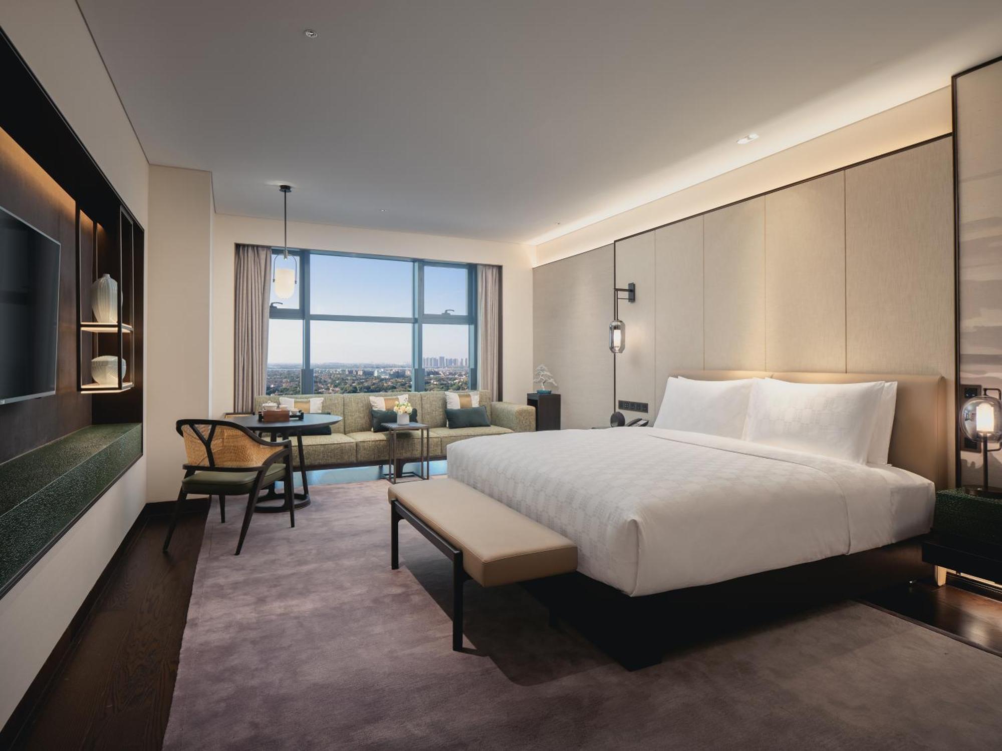 Hualuxe Kunshan Huaqiao By Ihg - F1 Racing Preferred Hotel Buitenkant foto